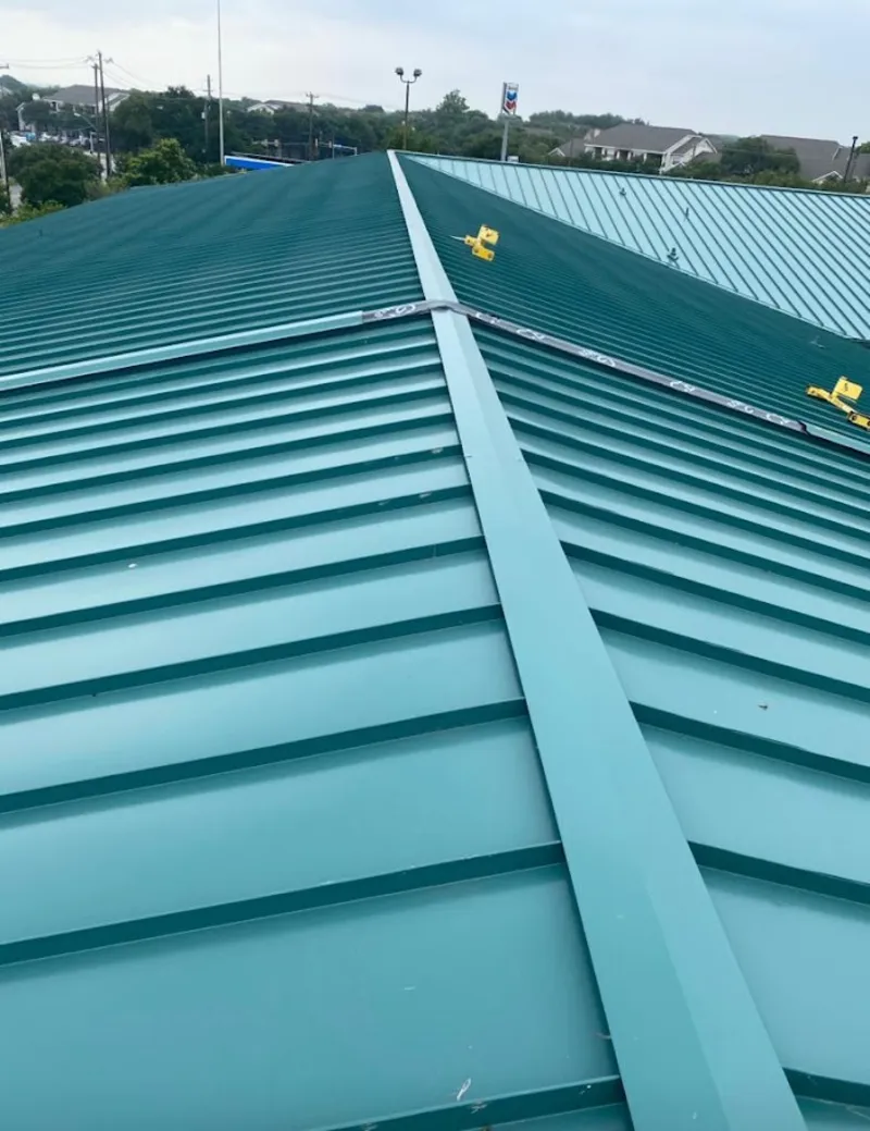 Green commercial metal roof ridge and valley for Metal Roof Repair in Little Canada