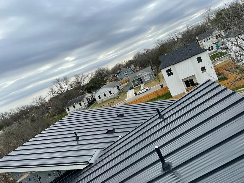 Standing seam metal roof panels with vents for Skylight Repair in Little Canada